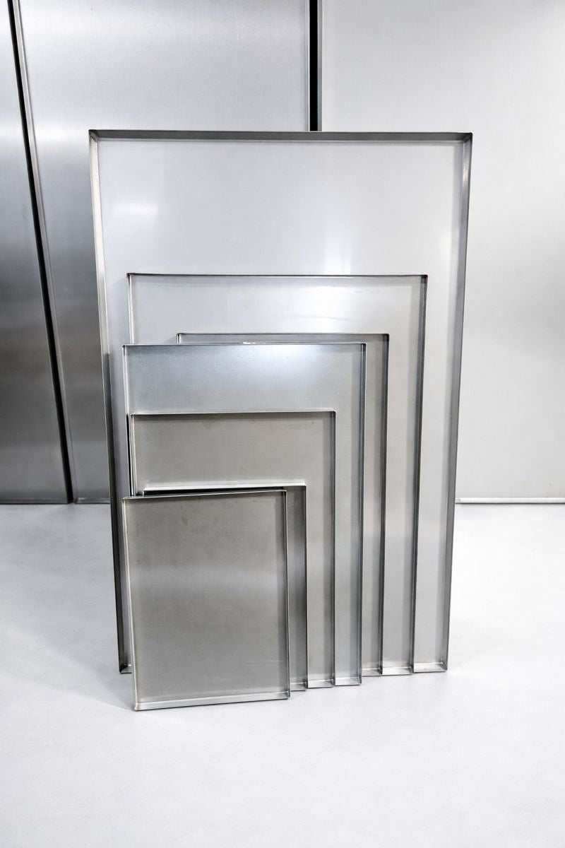 Heavy-duty metal dog crate replacement trays in multiple sizes